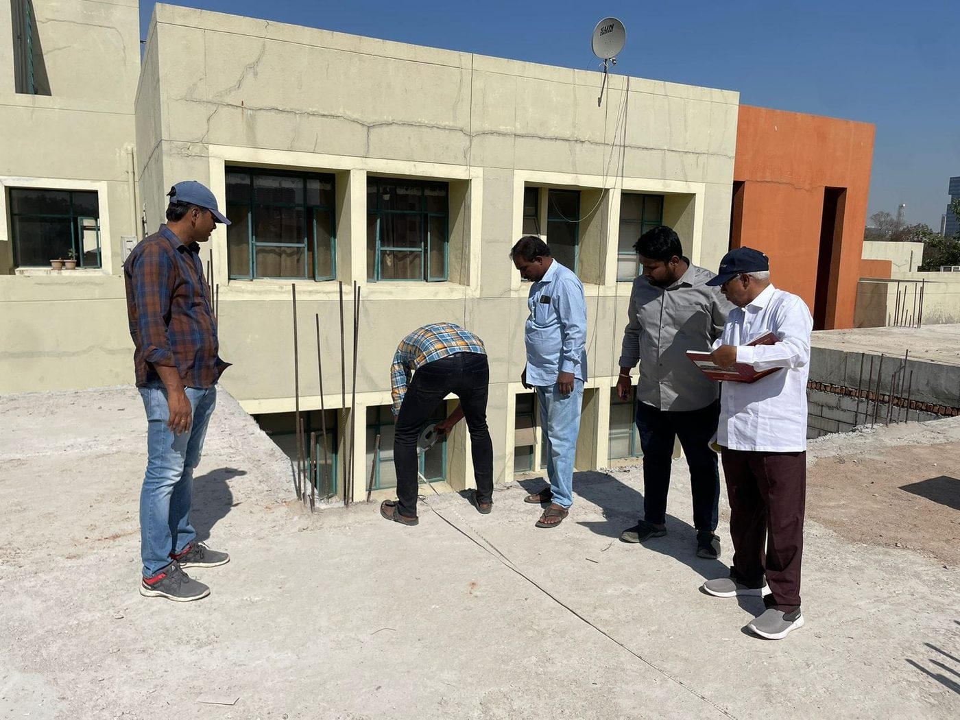 SS Constructions team reviewing structural work on site